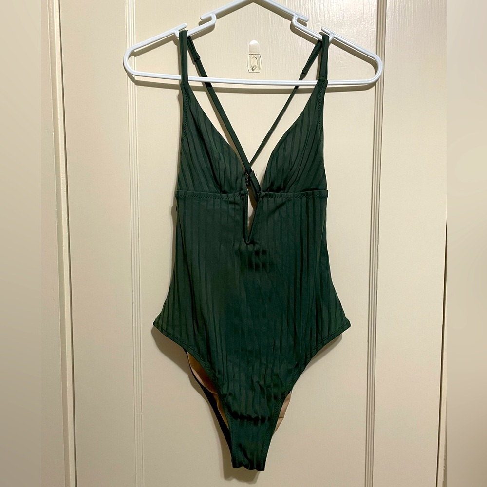Green, deep slit flattering lined swim suit